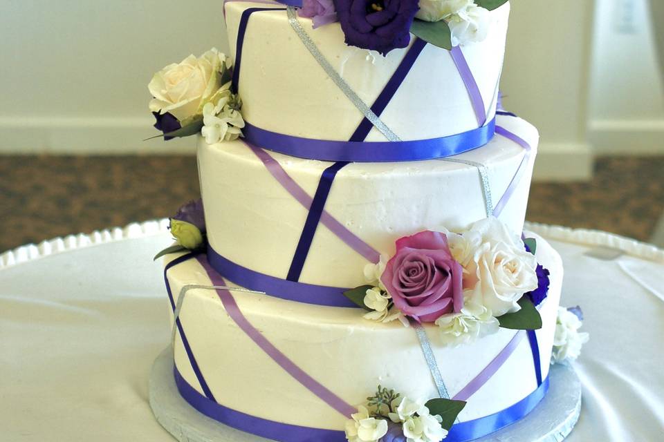 Purple ribbon abstract cake
