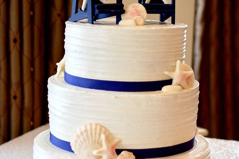 Navy ribbon tiered cake