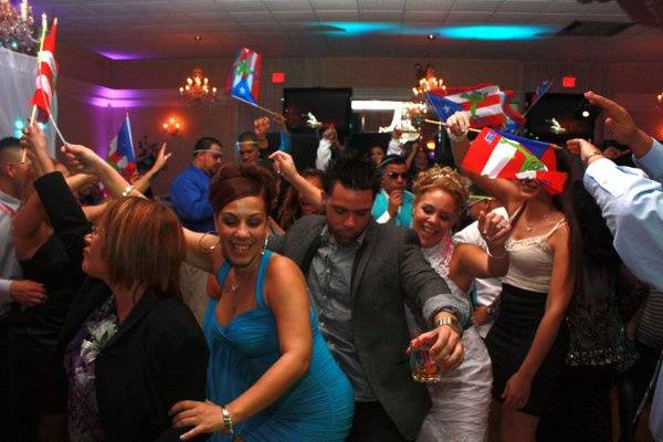 Kenny Q Productions gave away Puerto Rican Flags to the guests. Kenny Q has cases of these flags in storage.