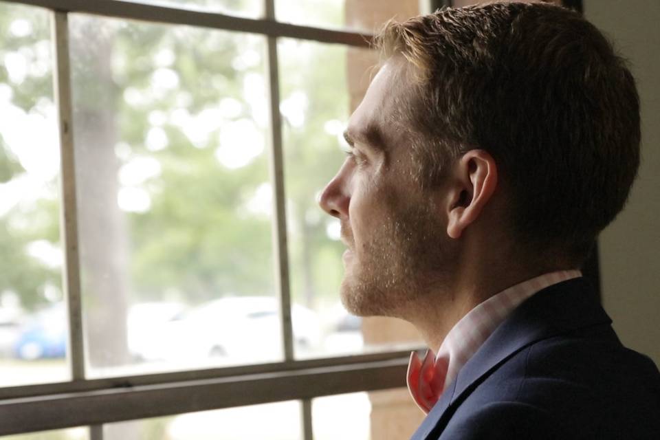 Groom preps for the ceremony