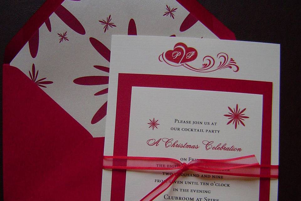 This wedding invitation ensemble was unique in that a Colombian bride was marrying a Russian groom.  The sets were printed in 3 different languages, Russian, Spanish and English.  Christmas themed wedding.