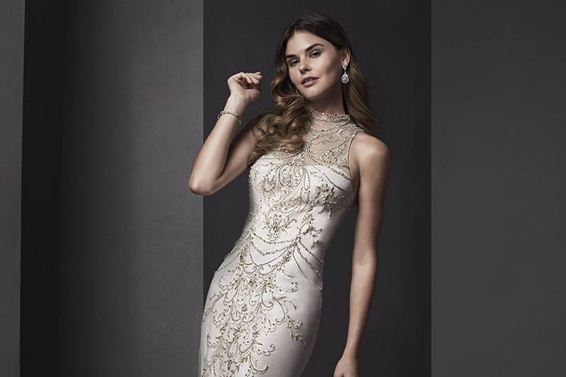 Catalina	<br>	Sophisticated and elegant is this tulle over Ava satin sheath gown. Covered in tulle and accented with intricate Swarovski crystal embroidery. Complete with mock-mandarin collar and finished with zipper closure.