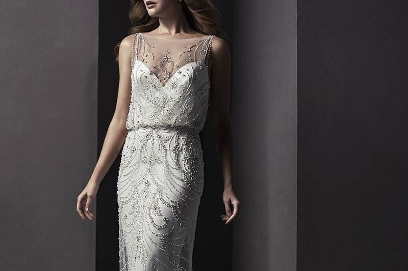 Renata	<br>	Glamorous tulle and Royal satin create this stunning sheath wedding dress, adorned with sparkling Swarovski crystals, a delicate blouson back and illusion neckline. Finished with zipper, and single pearl closure at back neckline.