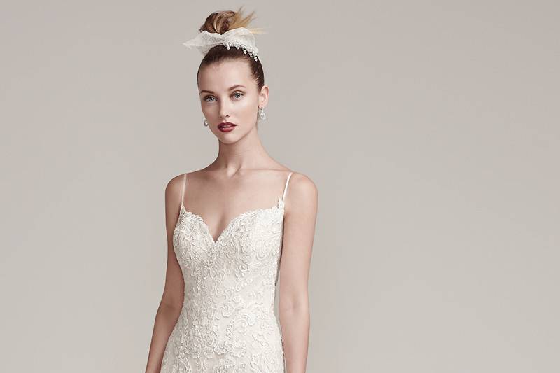 Parker<br> Soft meets sexy in this crosshatch tulle and lace sheath wedding dress with delicate spaghetti straps, sweetheart neckline and scalloped hemline. Finished with illusion tulle back and covered buttons over zipper closure.