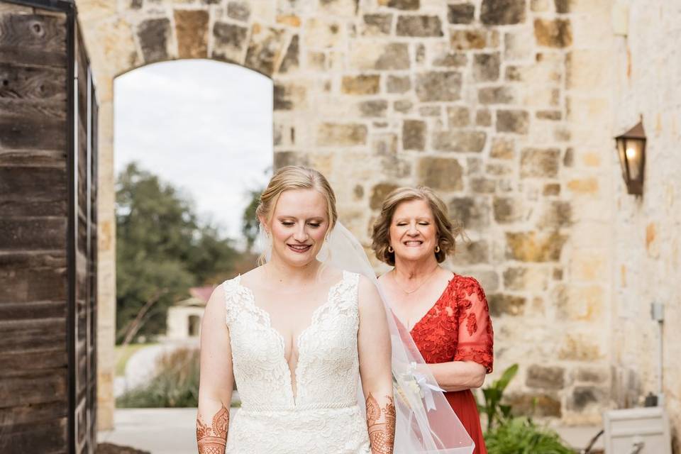 Mom helping bride