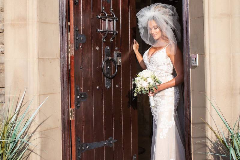 Bride at her door
