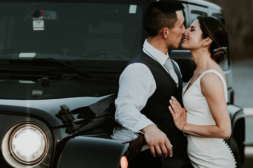 Kissing by the Jeep