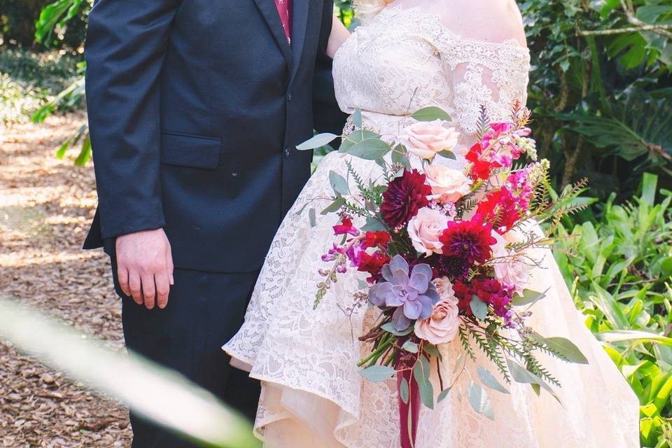 Couple with vibrant flowers