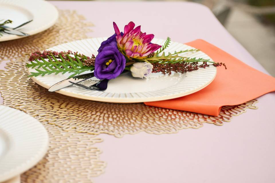 Place setting with flowers on plate