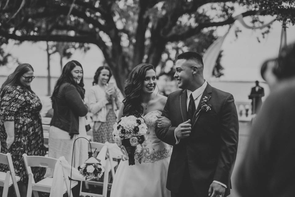 Newlyweds with classic bouquet