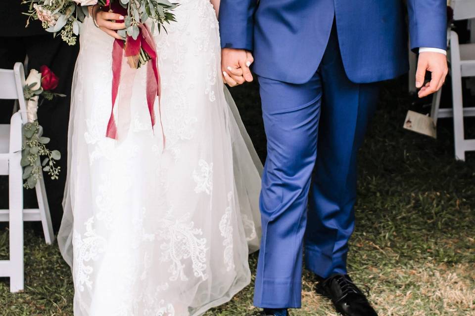 Newlyweds walk down the aisle