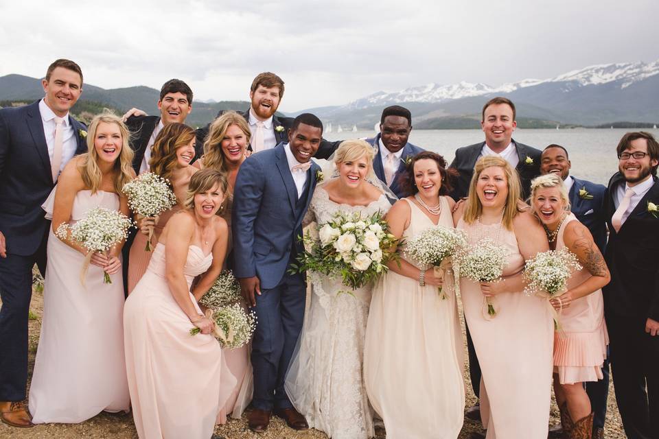 The couple with the bridesmaids and groomsmen