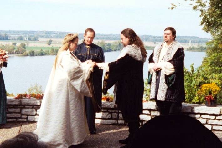 How about a renaissance ceremony. This one included special outfits for the wedding party, parents, grandparents, and even the officiant.