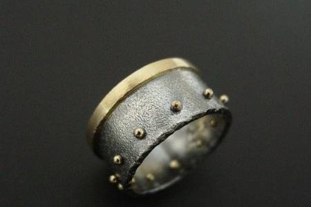 Sterling Silver and 18k yellow gold ring.