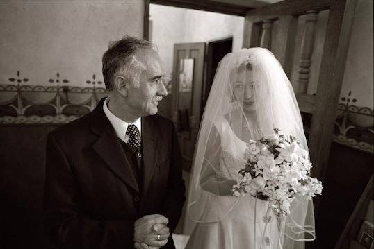 Just before Ania was walking down the isle to get married, she and her father has a little time together.