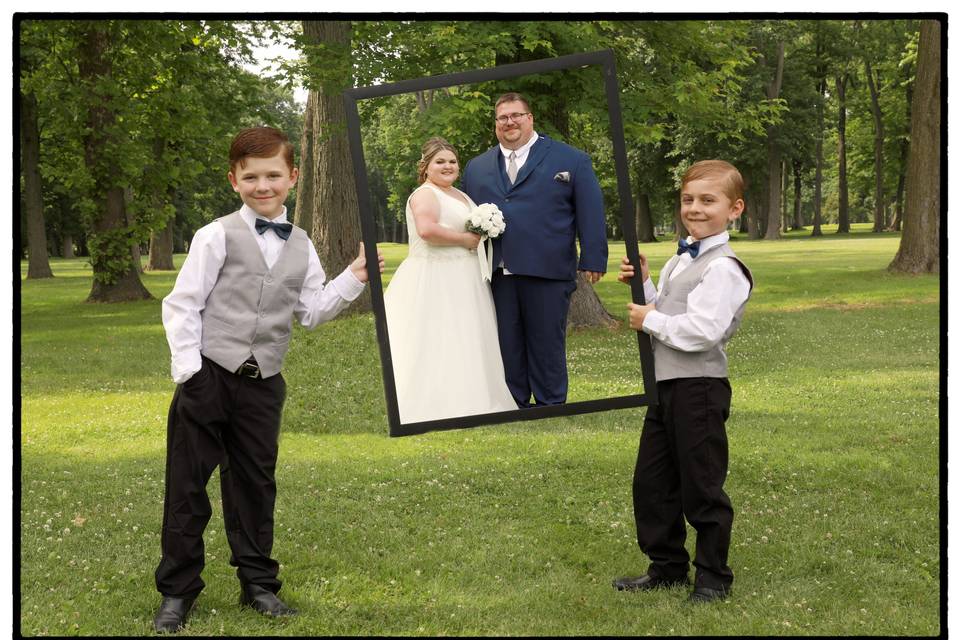 Ring bearers hold the frame