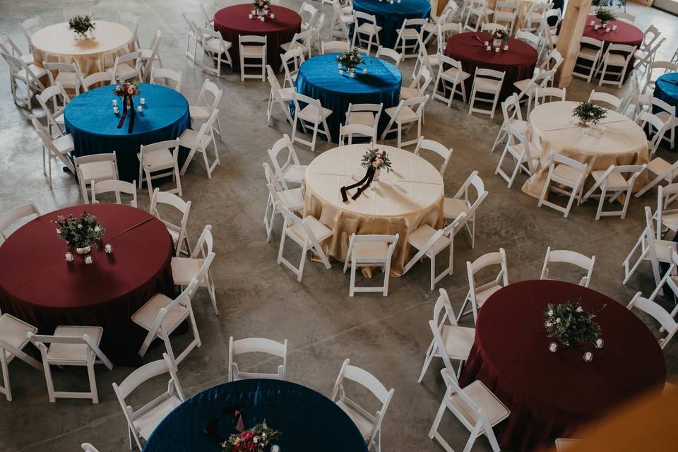 Round tables with multicolored linens