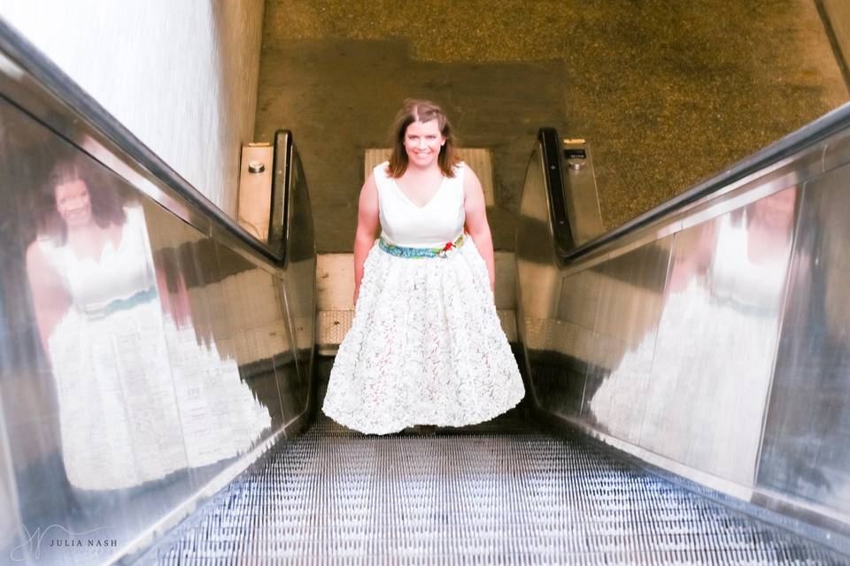 Bride ascending escalator