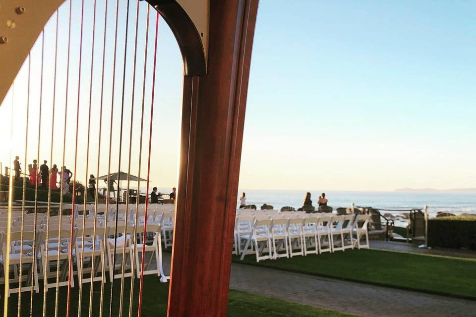 Ceremony harpist sunset beach