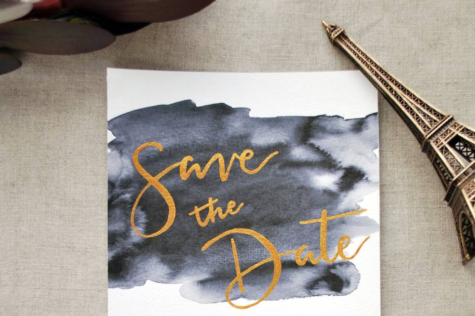 A Save the Date, using a combination of hand calligraphy and custom watercolor design.