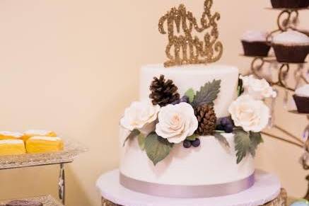 Five tier white and gold cake