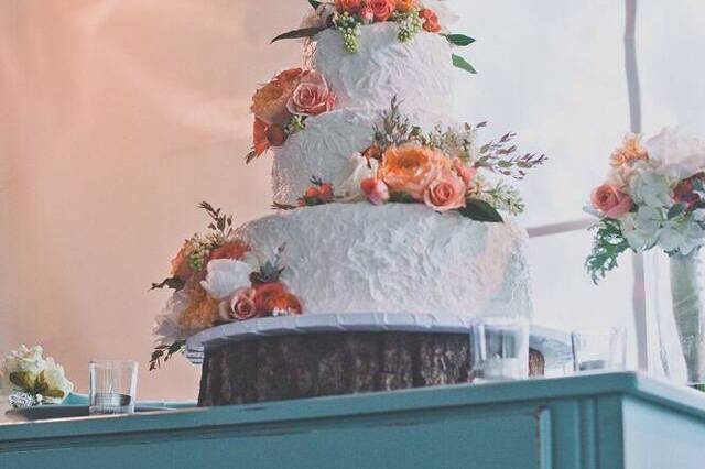 Wedding cake with orange flowers