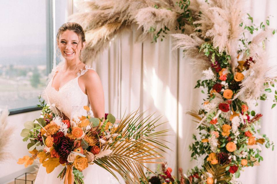 Pampas grass arch arrangement