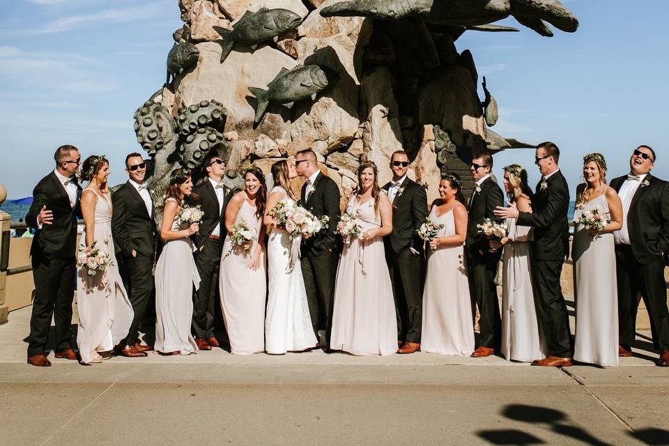 The couple with the bridesmaids and groomsmen