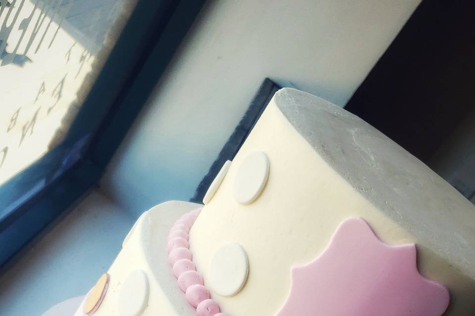 2-tier pink bow & polka dots cake