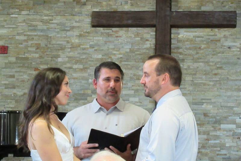 Officiant holding a wedding ceremony