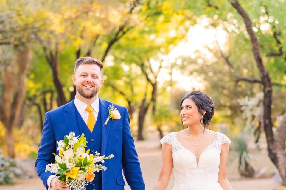 Bride smiling at groom walking