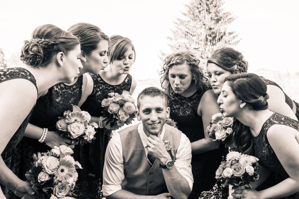 Groom with bridesmaids