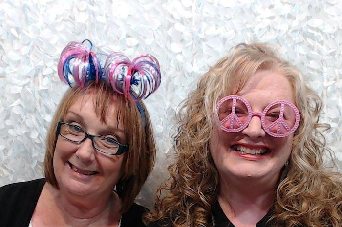 BESTIES love the photo booth!  This is our wedding fluffy background (white)