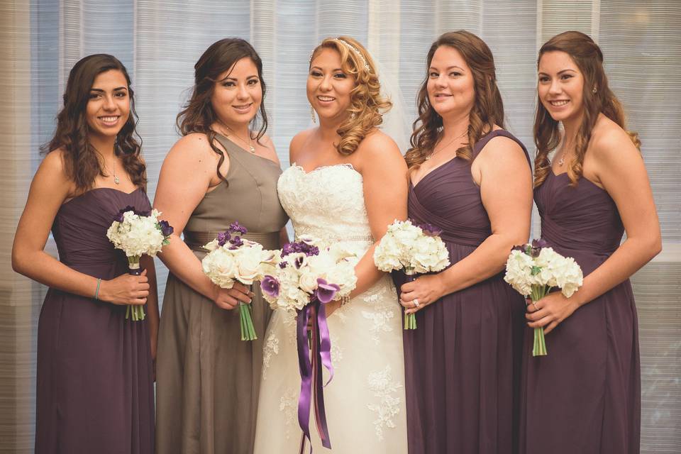 Bride, maid of honor, and bridesmaids