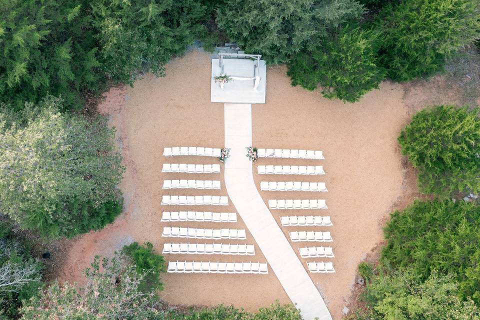 Drone shot of wooded ceremony