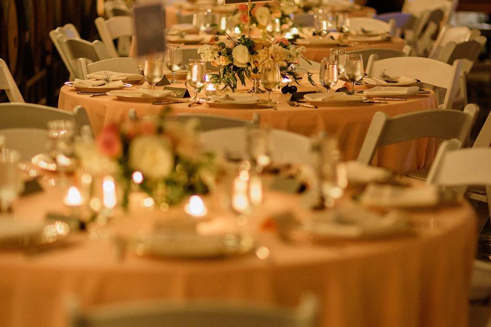 Peach linens + white chairs