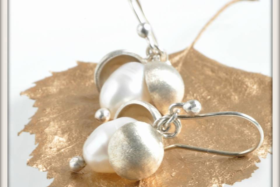 Large Peapod Earrings in White Pearl - Gorgeous white freshwater pearls nestled between hand-formed large frosted sterling silver peapods, dangled from sterling silver French ear wires.