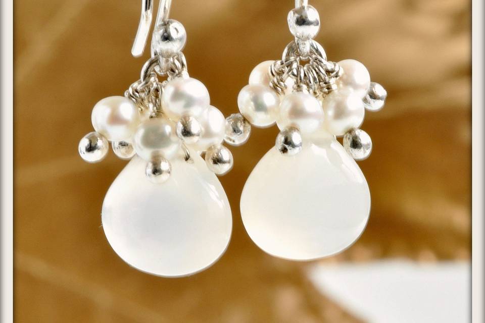 Whisper Earrings in White Pearl and Chalcedony - Stunning chalcedony drops set off by delicate sprays of round white pearls, hanging from handmade sterling silver ear wires.