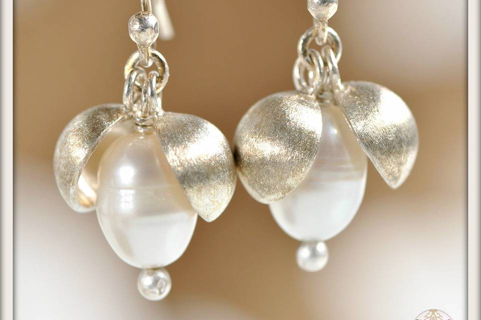 Large Peapod Earrings in White Pearl - Gorgeous white freshwater pearls nestled between hand-formed large frosted sterling silver peapods, dangled from sterling silver French ear wires.