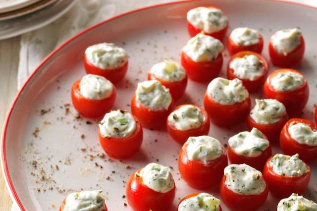 Cheese and herb stuffed tomato