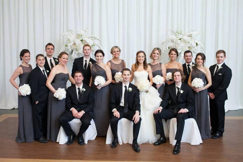 The couple with the bridesmaids and groomsmen