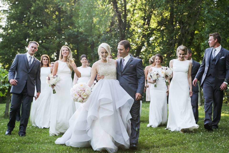 The couple with the bridesmaids and groomsmen