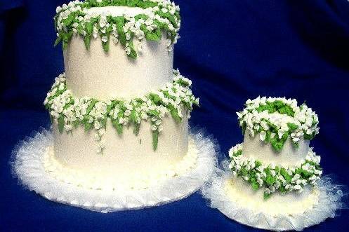 Lily of the Valley Wedding cake and mini! This cake is flanked by a smaller version that was going on the honeymoon!