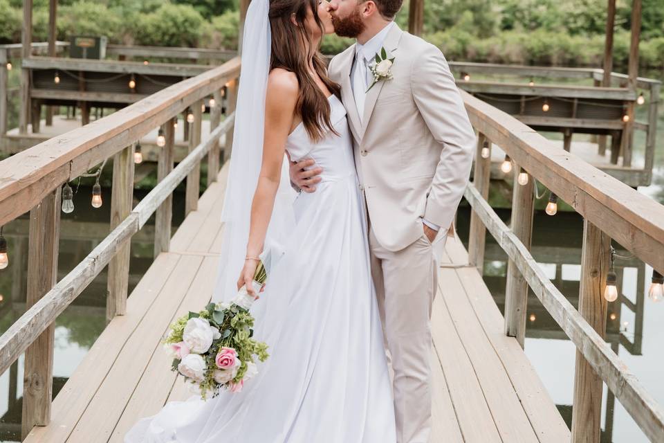 Bride and groom on the water
