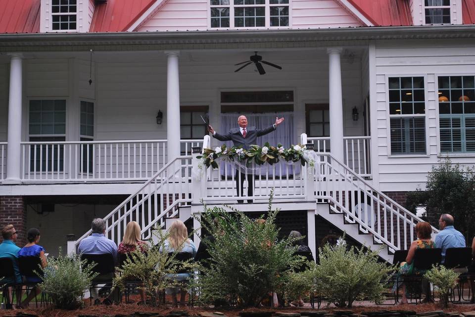 Large backyard wedding ceremony