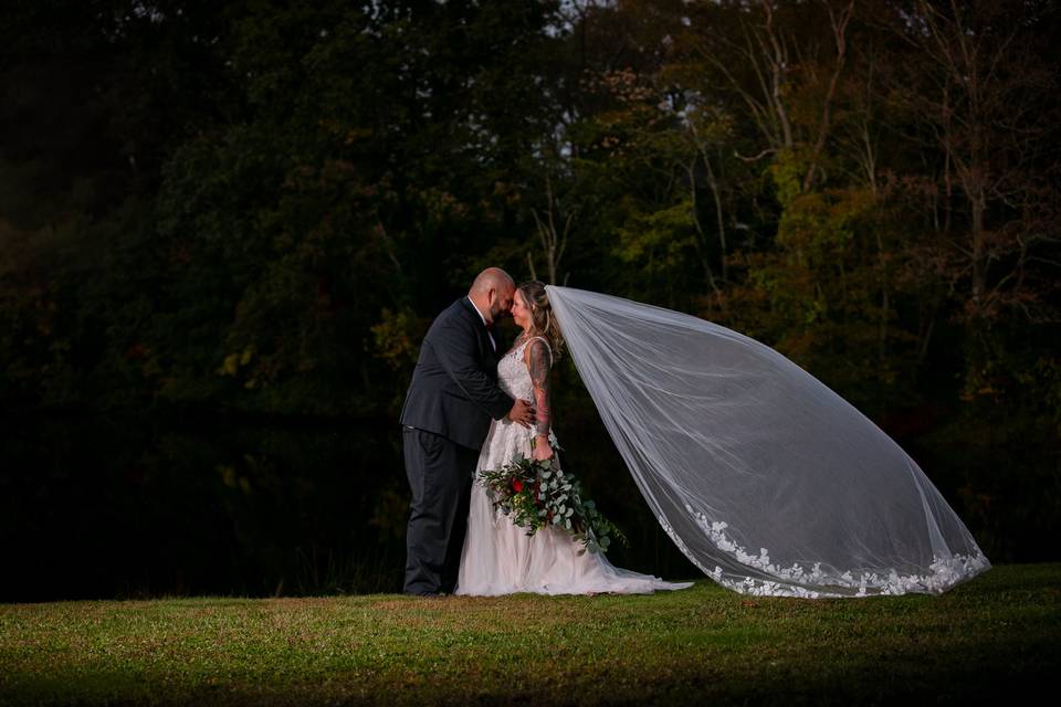 Bride & groom - veil shot