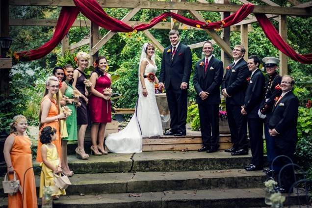 The couple with the bridesmaids and groomsmen