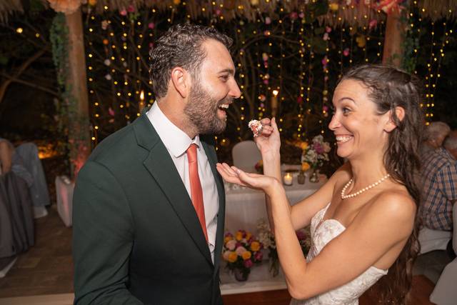 The Bride feeds the Groom