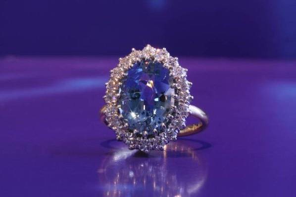 Custom design classic Aquamarine and Diamond engagement ring made of platinum and 18k yellow gold.