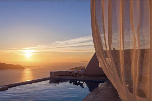 Poolside loungers at sunset